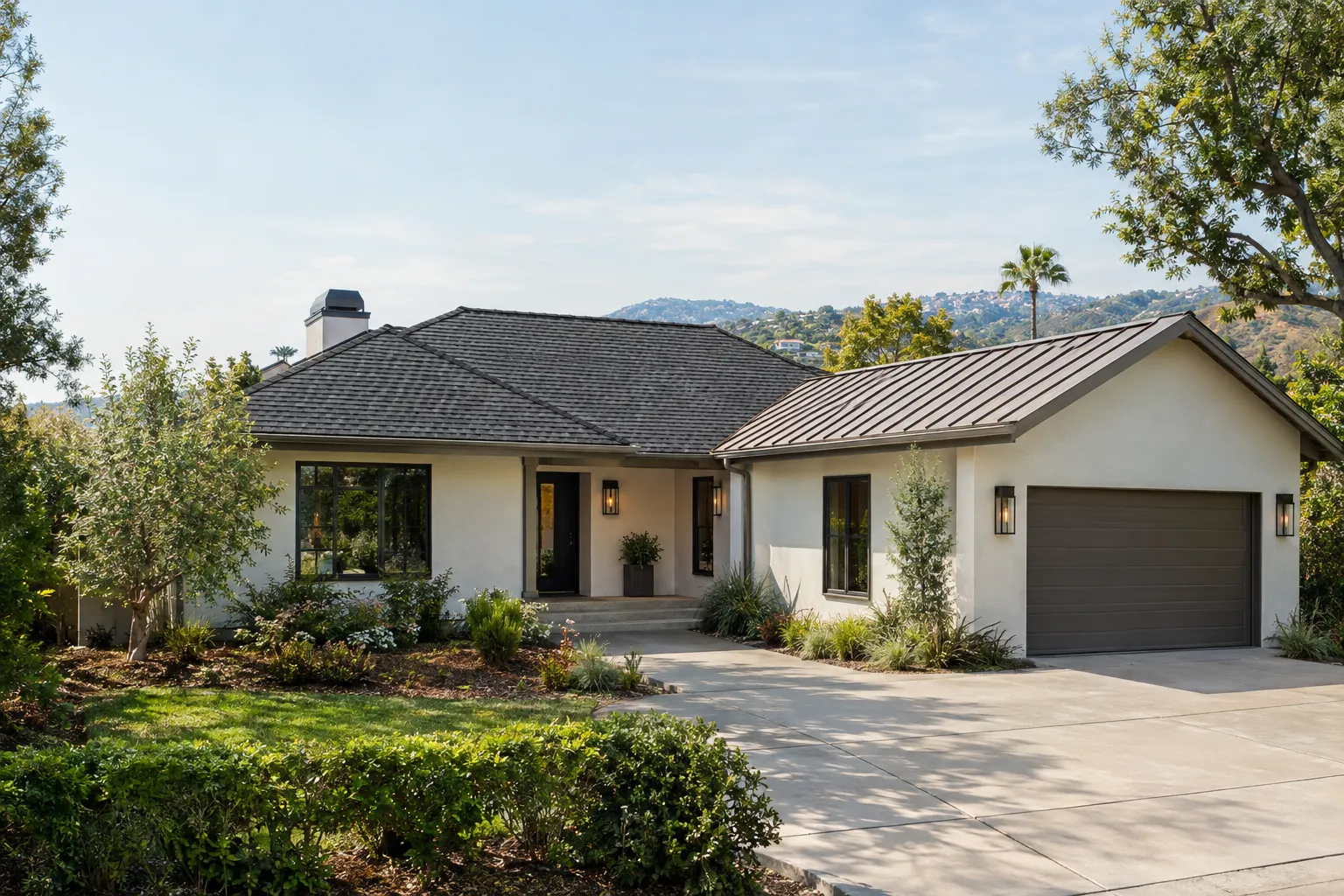 Architectural shingles and standing-seam metal roofing on a Westlake Village, California home
