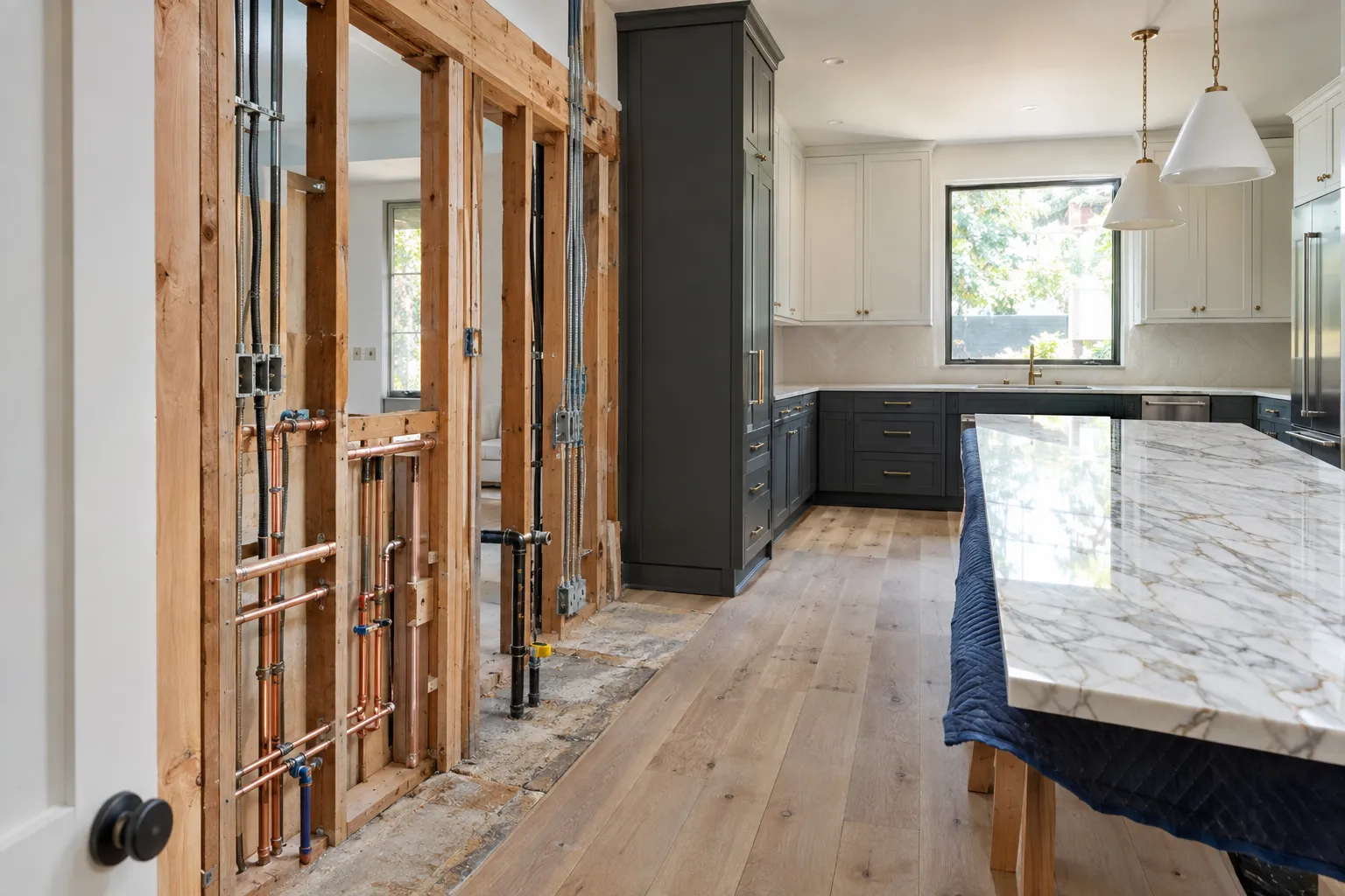 West Hollywood, California kitchen remodel showing plumbing, gas, electrical, and framing work that affects renovation costs
